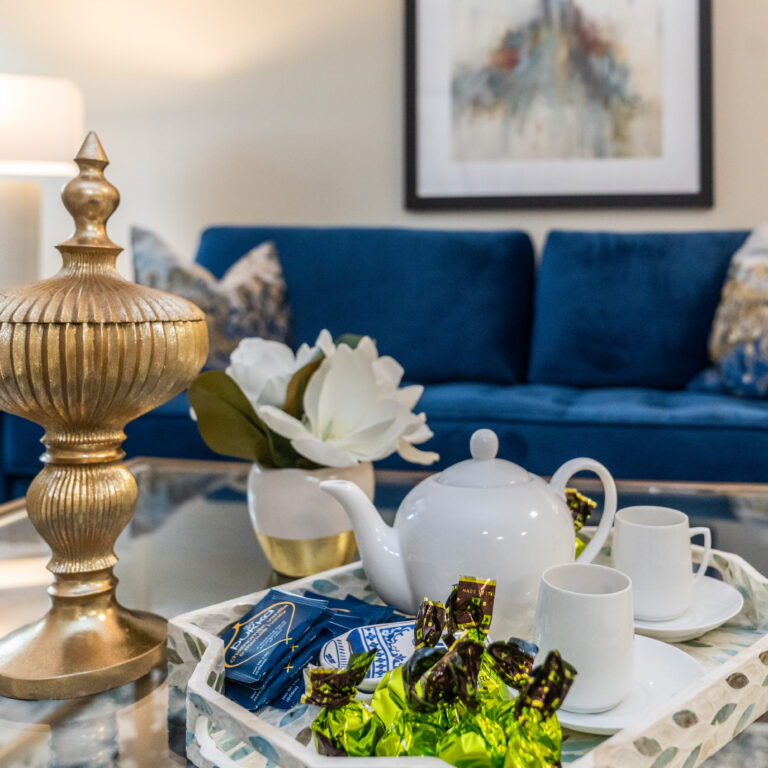 Spacious living room up close with the tea set in focal point